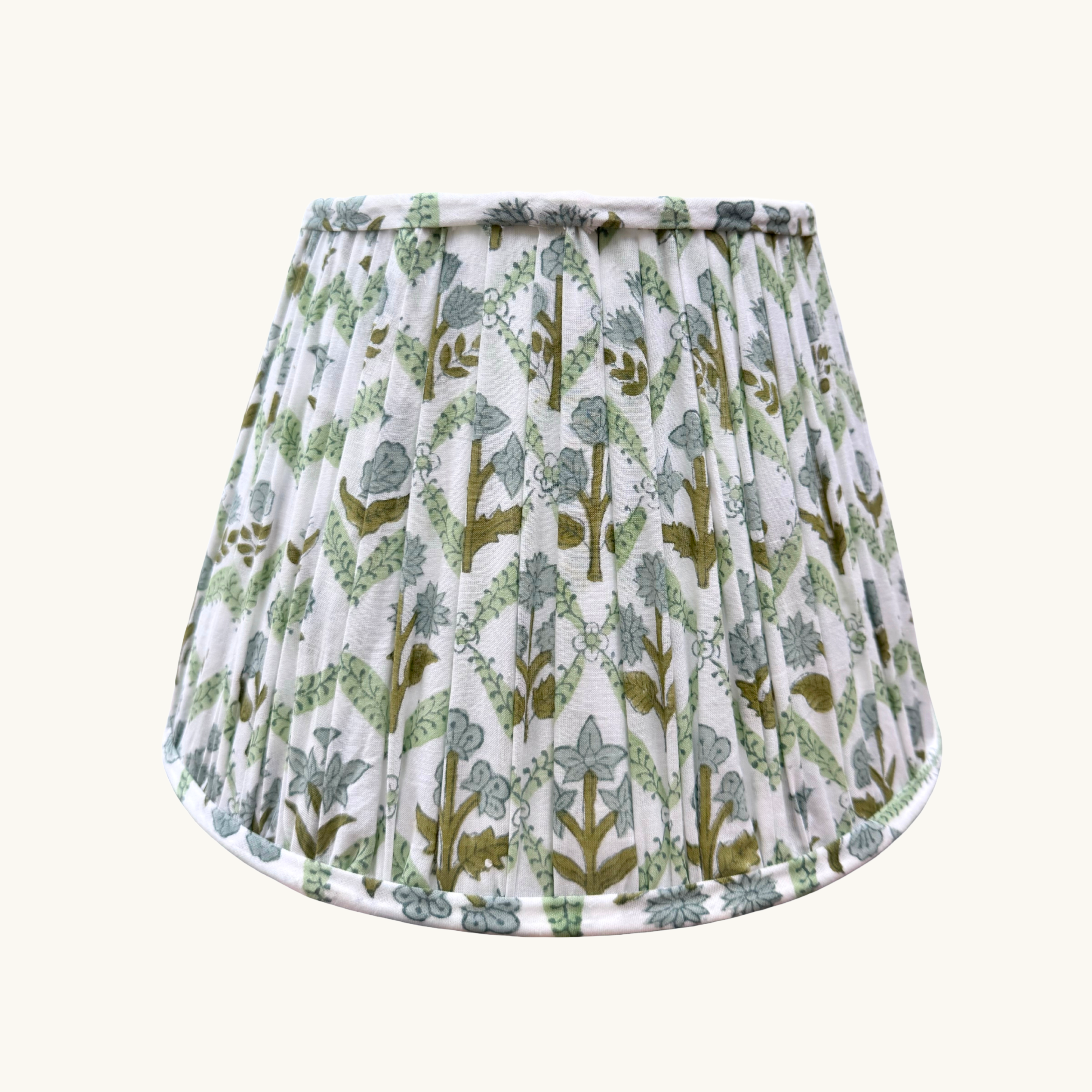 Lampshade with blue and green floral pattern on a white background