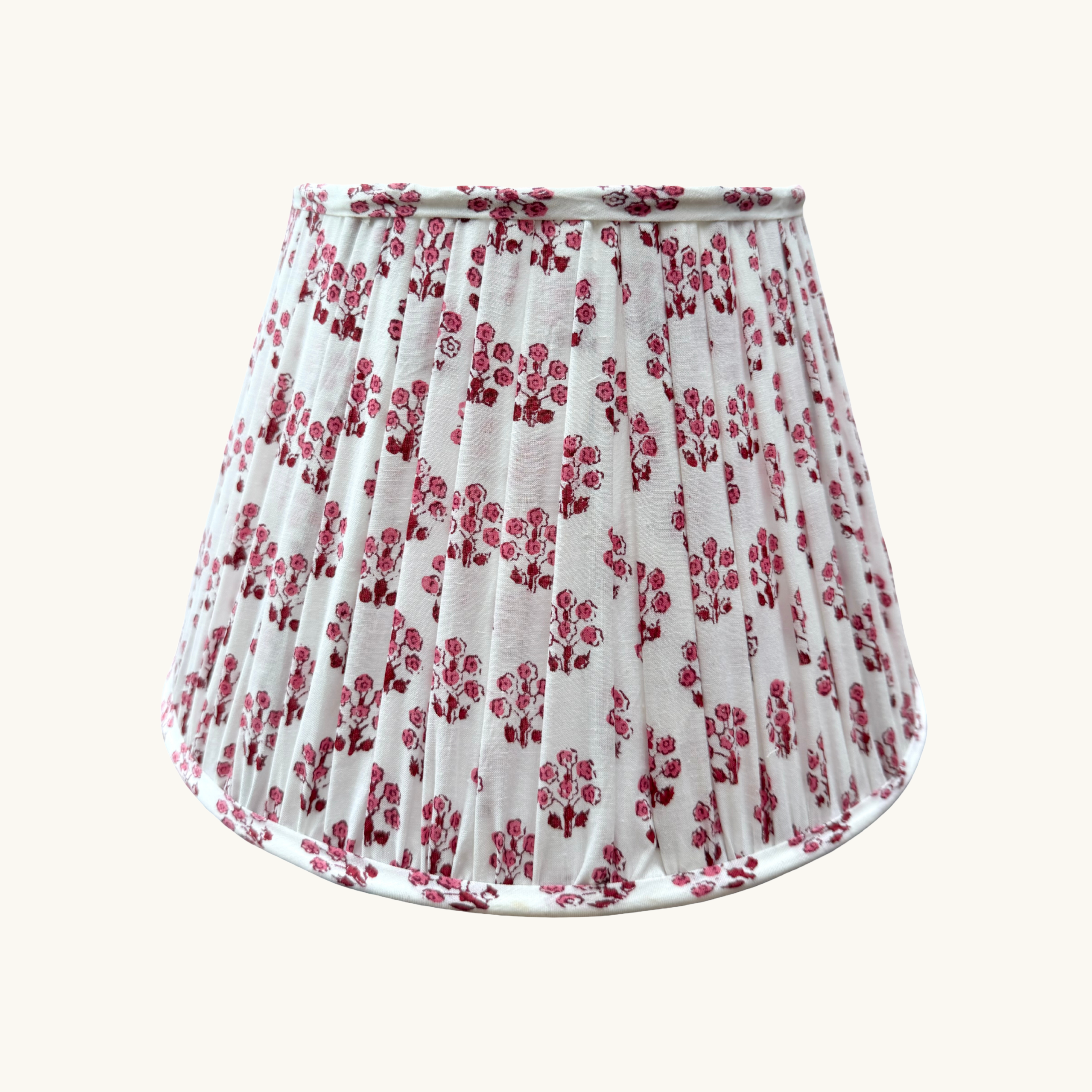 Pink Floral patterned lampshade on a white background