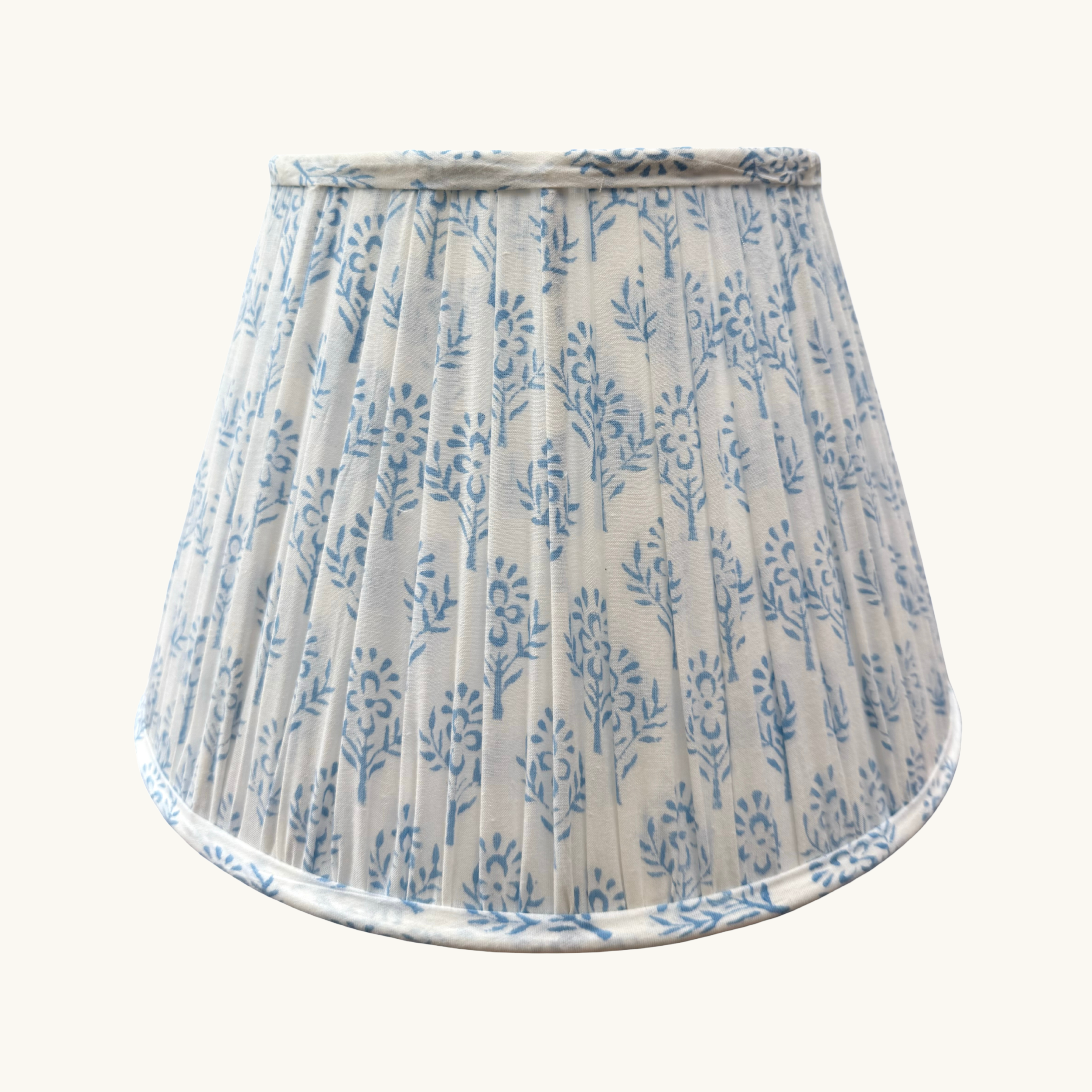 Lampshade with blue floral pattern on a white background