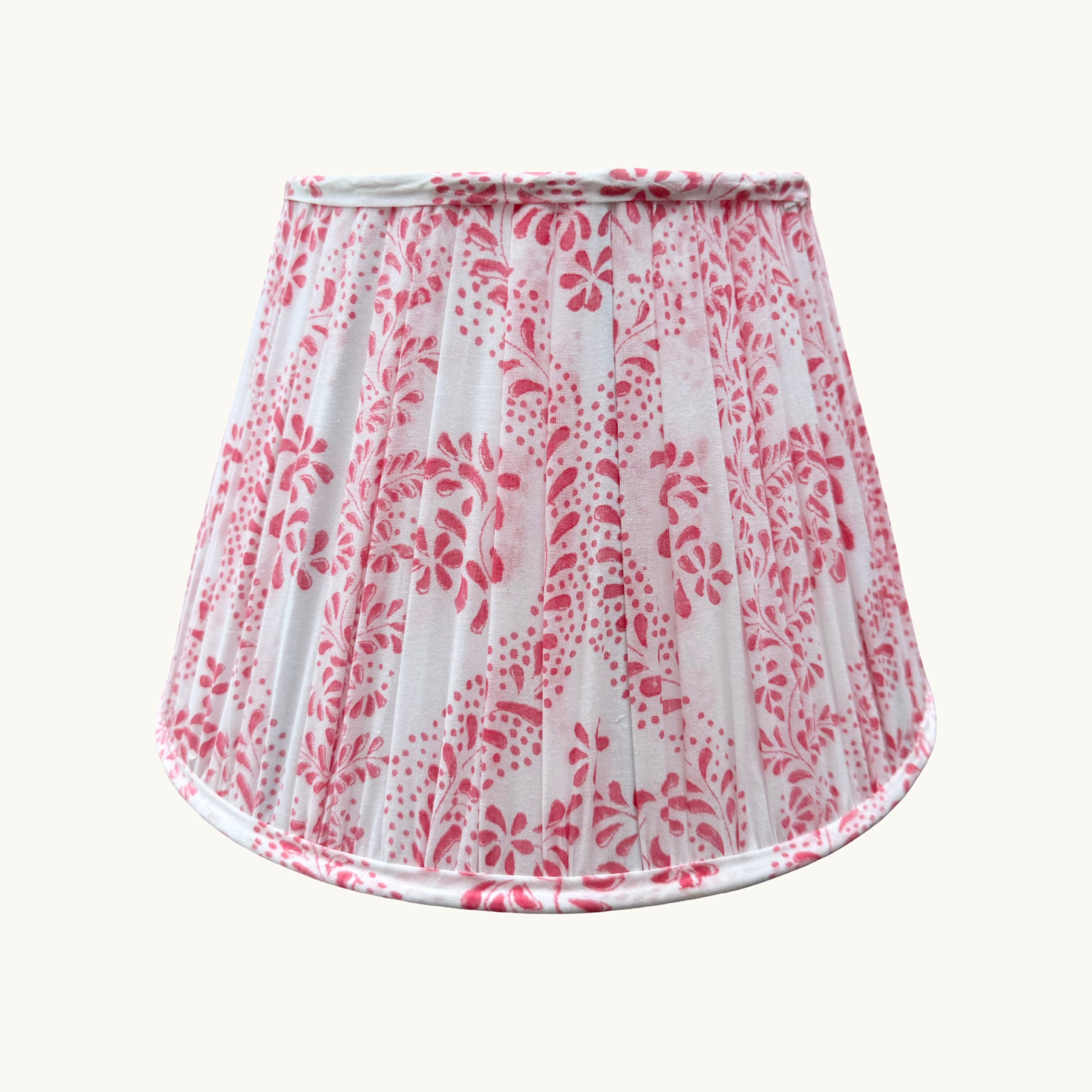 Pink Floral patterned lampshade on a white background