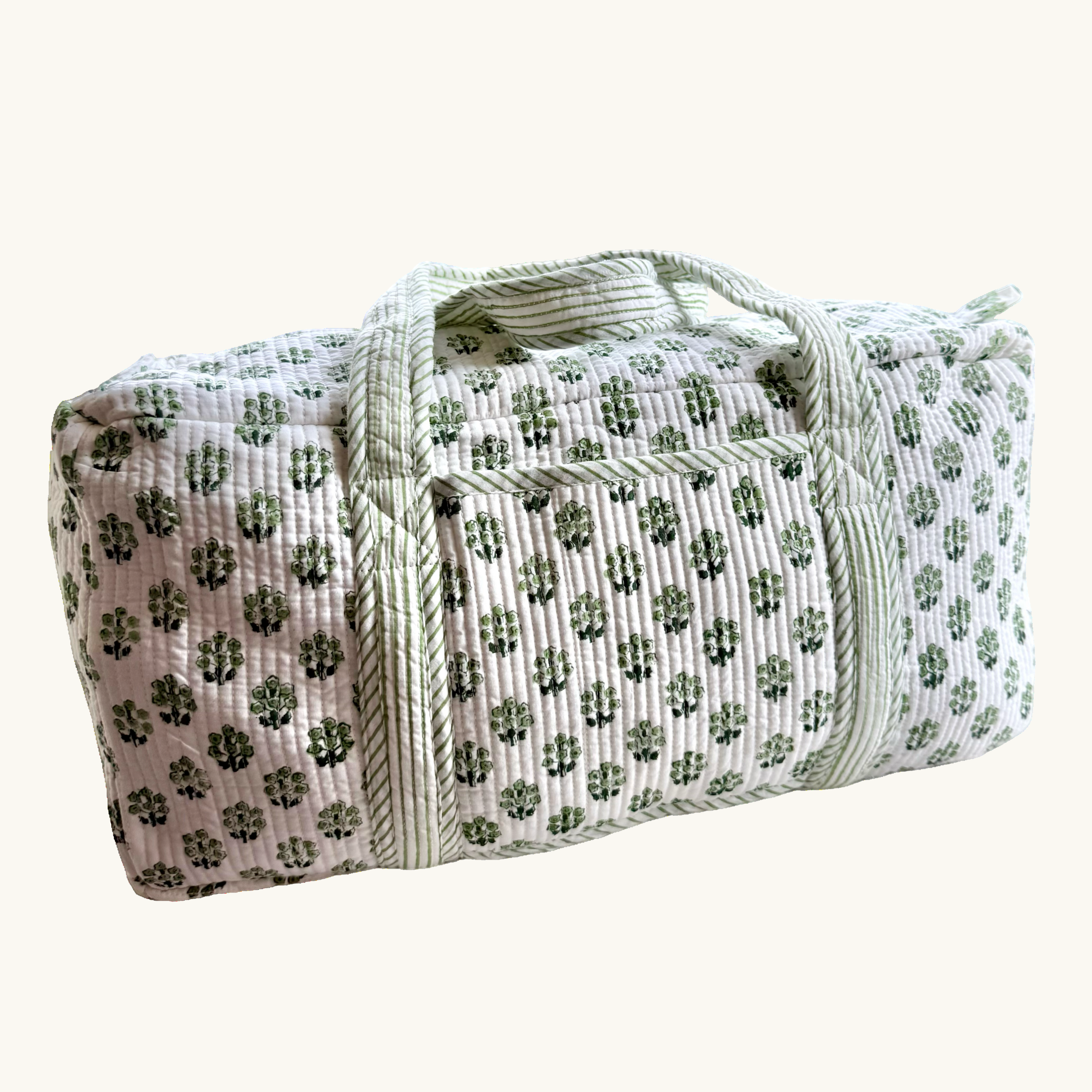 Green floral weekend bag on a white background