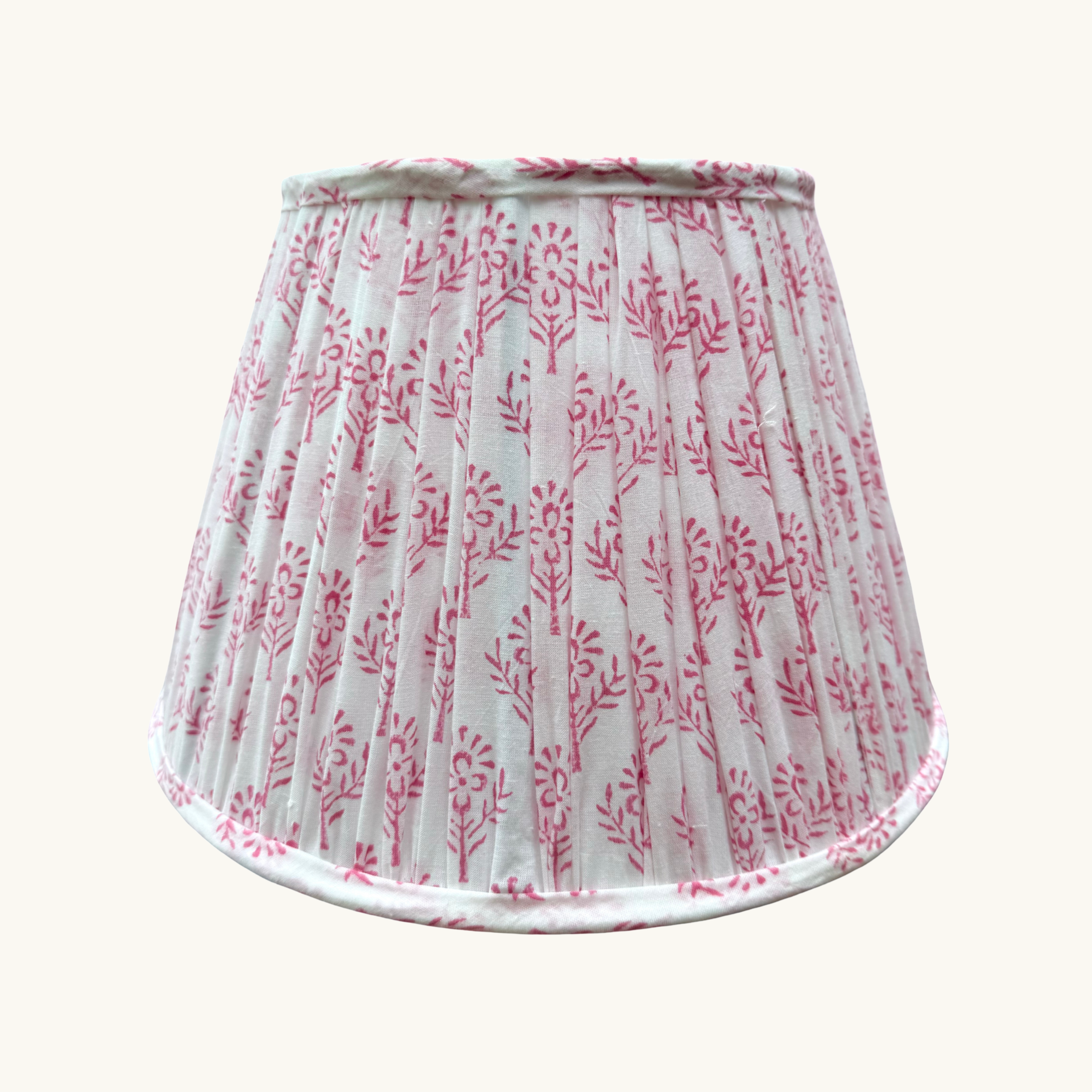 Lampshade with pink floral pattern on a white background